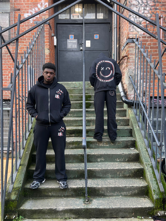 BLACK GLITCHED ACCLAIMEDPRIVACY TRACKSUIT